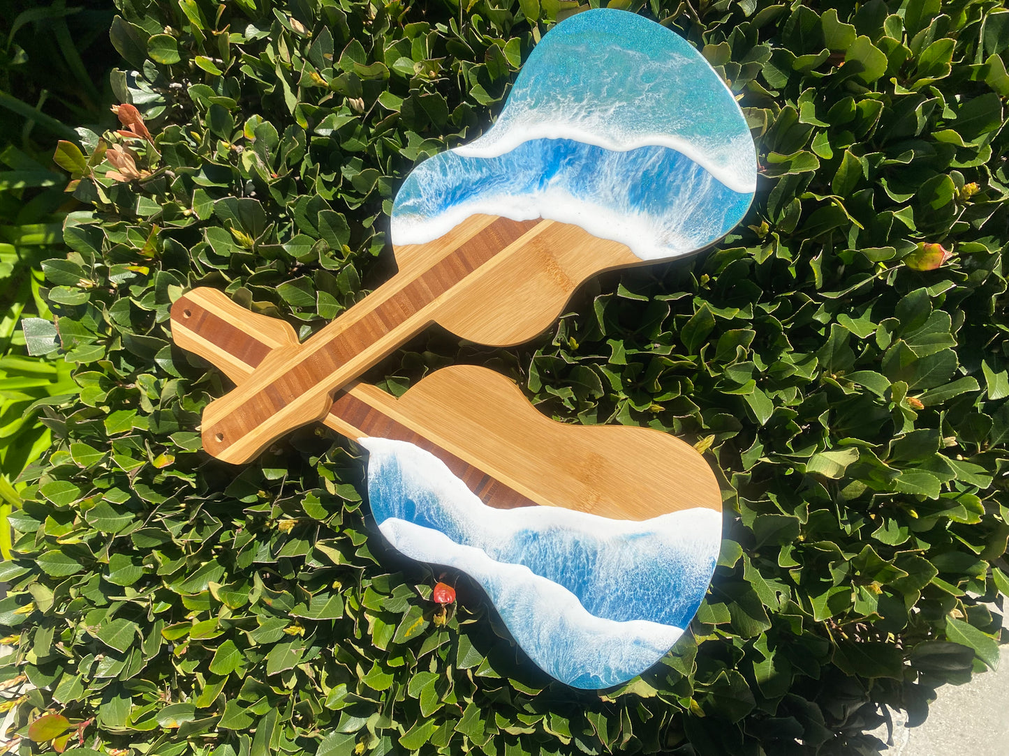 Guitar Shaped Ocean Resin Bamboo Serving and Cutting Board – a harmonious blend of musical inspiration and culinary functionality.